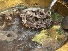 -周老三跷脚牛肉·全牛火锅(非遗传承店)