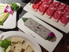 -老牌坊云南鱼豆花火锅(哈西万达店)