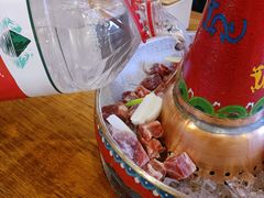 -毛辣果·贵州红酸汤牛肉火锅(西单店)