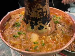 土司铜锅油焖鸡-浩海火烧云傣家菜(京广店)