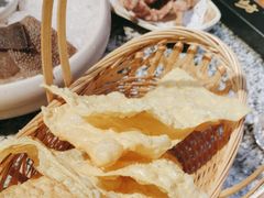 -老牌坊云南鱼豆花火锅(哈西万达店)