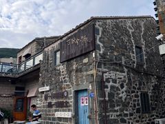 门面-石头会唱歌融来+北港岚台两岸交流中心