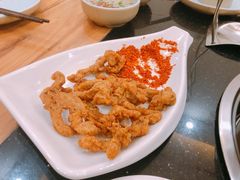 -明何记涮牛肚(品牌首店隋唐植物园南门古城路店)