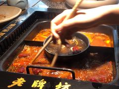-老牌坊云南鱼豆花火锅(哈西万达店)