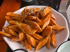 拔丝地瓜-三江鱼东北特色铁锅炖(骆驼店)