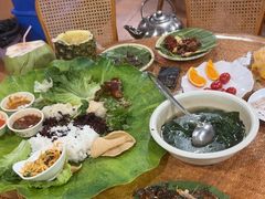 -沐毫傣泐云南菜孔雀宴•手抓饭傣味烧烤(曼听公园店)
