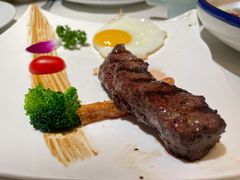 黑椒朗姆牛排配煎蛋-俄士厨房(时代天街店)