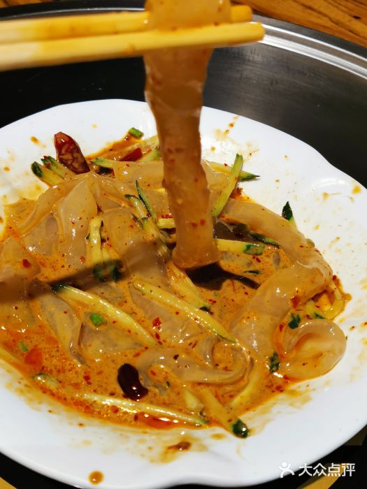 安诚居干锅鸭头(八角店)东北拉皮图片