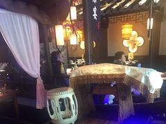 门口的古筝-绿茶餐厅(松江万达店)