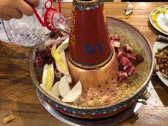 -毛辣果·贵州红酸汤牛肉火锅(西单店)