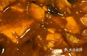 Tofu Stewed with Corn Dumplings