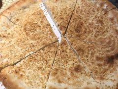 馕坑芝麻馕-巴扎美食·新疆菜·西域歌舞表演餐厅(新疆大厦店)