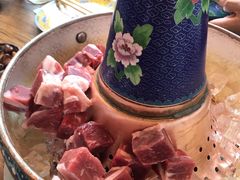 -毛辣果·贵州红酸汤牛肉火锅(西单店)