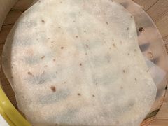 最下面一张又凉又硬的饼-三人行骨头王火锅(长寿店)