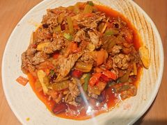 傣味腊腌菜炒牛肉-金孔雀德宏傣味餐馆(魏公村店)