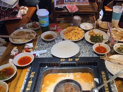 -老牌坊云南鱼豆花火锅(哈西万达店)