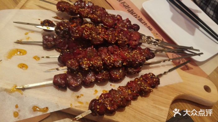 久里精酿啤酒餐厅(南岗工大店)生烤自制干肠图片