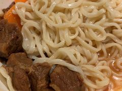 番茄牛肉剪刀面-九毛九西北菜(百信广场店)