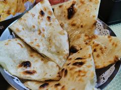 黄油馕饼-蓝孔雀美食(南岗店)