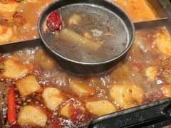 -老牌坊云南鱼豆花火锅(哈西万达店)