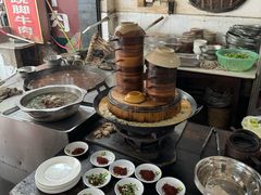 -周老三跷脚牛肉·全牛火锅(非遗传承店)