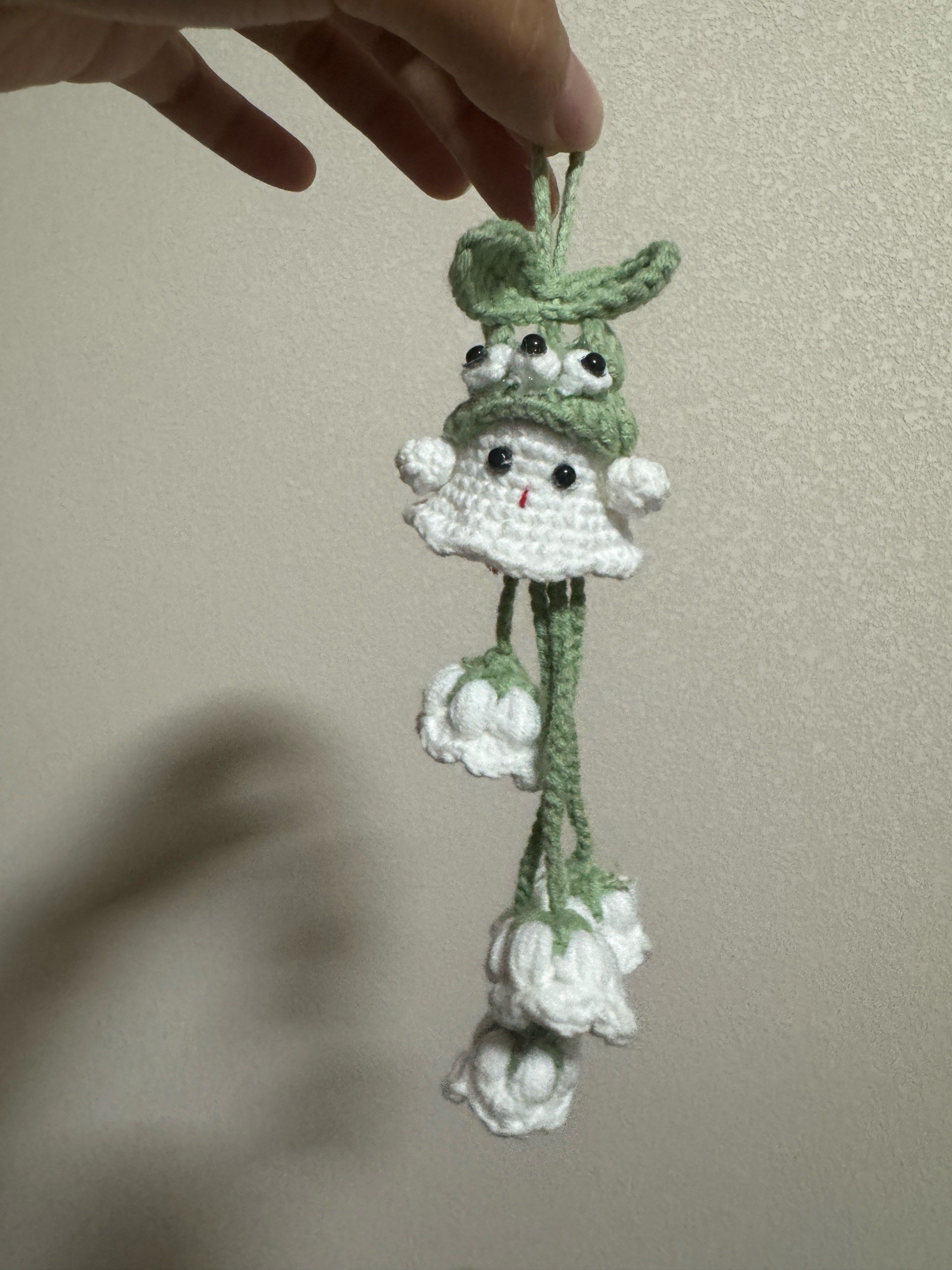 手工编织的三眼仔挂件