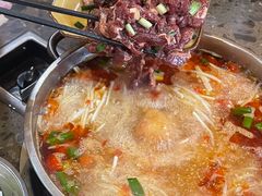 -黄利砖万峰林布依特色酸笋牛肉馆