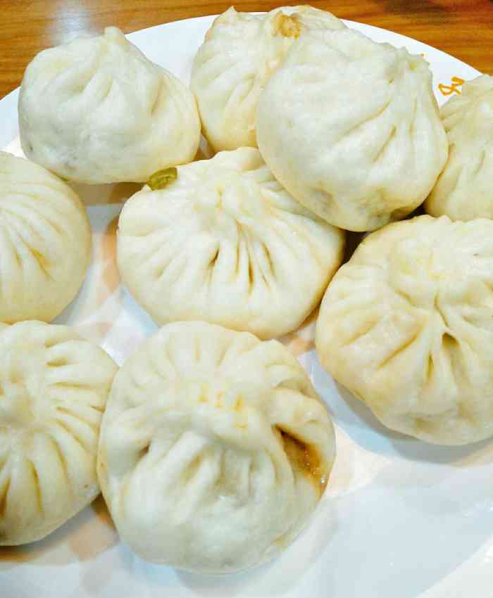 李记前门包子铺-"[薄荷]环境:这家包子店店面不大,但是.