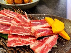 极品浇汁肥牛肋条-草家酱蟹炭火烤肉店(珲春南路一店)