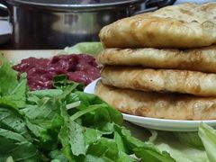 -周老三跷脚牛肉·全牛火锅(非遗传承店)