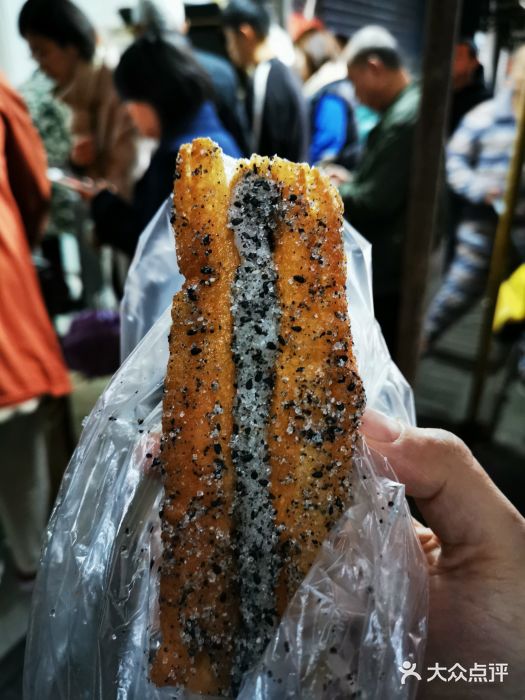 抚州弄口油条摊油子包麻子图片