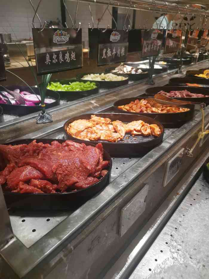 欢乐牧场海鲜烤肉自助(牡丹园店)-"今天请同事吃饭 没太好意思拿着