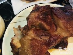 东北熏全肘子-东北农家院·铁锅炖(莘庄店)