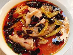 特色酸菜肉片米线-巴鑫田姐米线(巴南万达店)