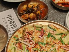 -草家酱蟹炭火烤肉店(珲春南路二店)