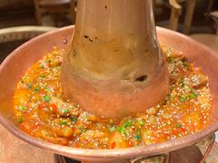 土司铜锅油焖牛肉-浩海火燒雲傣家菜(芮欧百货店)