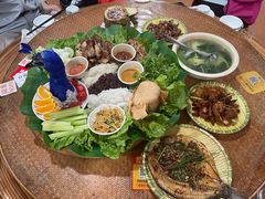 -沐毫傣泐云南菜孔雀宴•手抓饭傣味烧烤(曼听公园店)