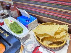 -老牌坊云南鱼豆花火锅(哈西万达店)