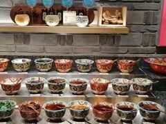 -老牌坊云南鱼豆花火锅(哈西万达店)