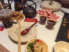 -老牌坊云南鱼豆花火锅(哈西万达店)