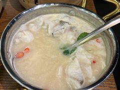 酸汤煮嫩滑鱼片-小大董·烤鸭(王府井apm店)