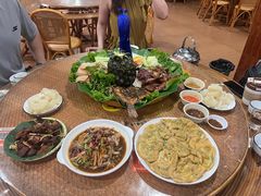 -沐毫傣泐云南菜孔雀宴•手抓饭傣味烧烤(曼听公园店)