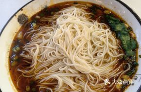 Large Bowl of Noodles with Beef, Intestines, and Egg