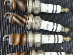换下来的火花塞-友谊汽车维修保养·钣金喷漆事故定损·洗车贴膜