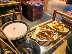 -老牌坊云南鱼豆花火锅(哈西万达店)