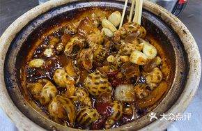 Braised Flower Snail in Clay Pot