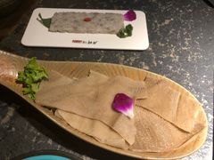 -老牌坊云南鱼豆花火锅(哈西万达店)
