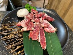 极品浇汁肥牛肋条-草家酱蟹炭火烤肉店(珲春南路一店)