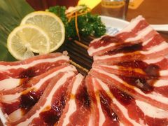 浇汁肥牛肉-正宗齐齐哈尔烤肉·齐牛哥鲜切炭火烤肉(杭州总店)