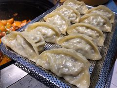 小鸡炖蘑菇蒸饺-山河屯铁锅炖(哈西站店)